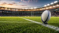 Rugby ball on a kicking tee inside a stadium before kick-off