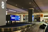 Bagages sur un tapis d'aéroport
